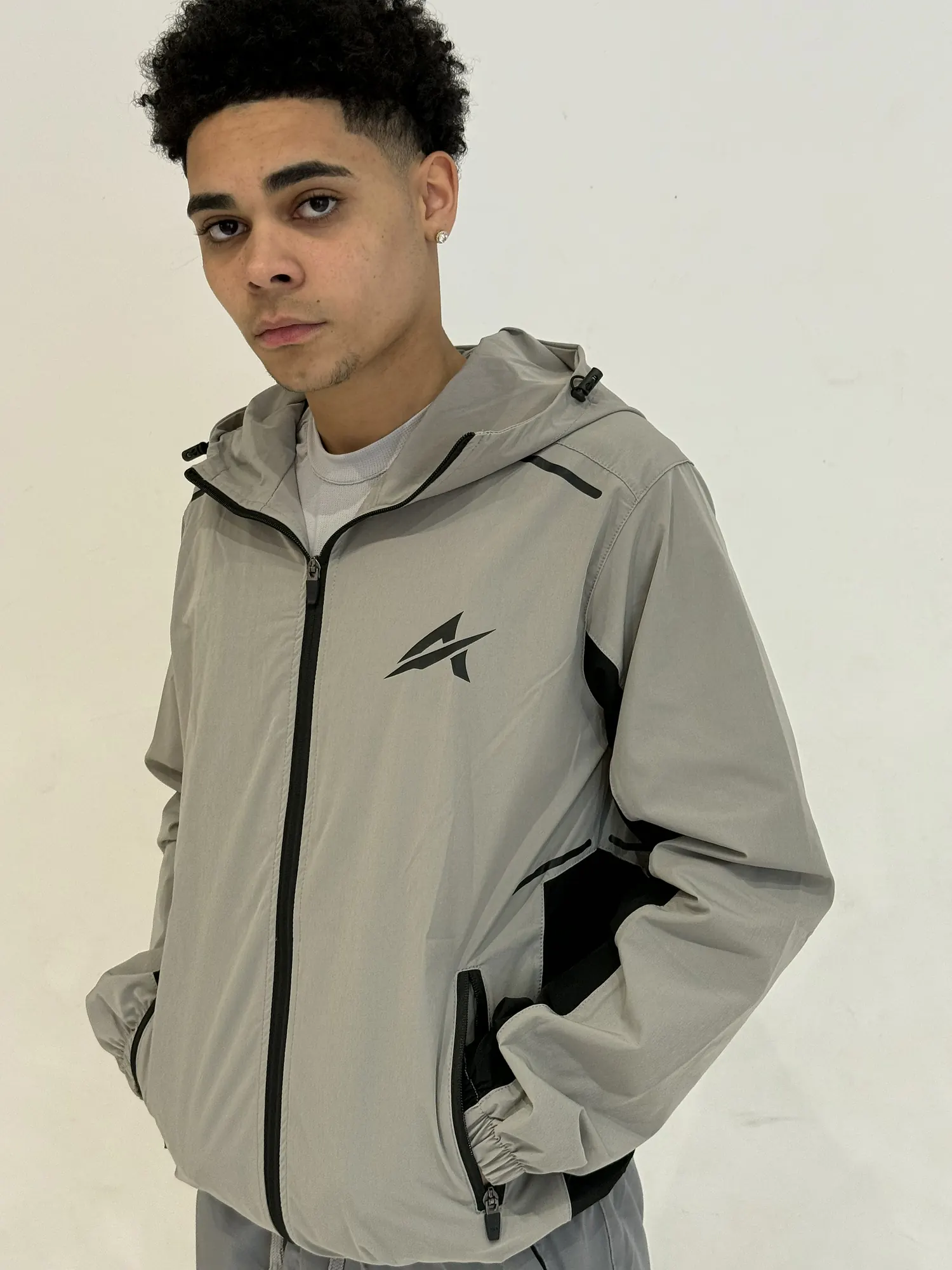 Apto grey windbreaker campaign photo